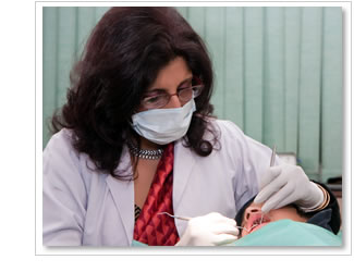 Dr. Neena Moitra with patient