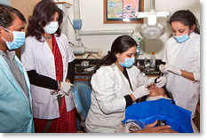 Dentists working on a patient